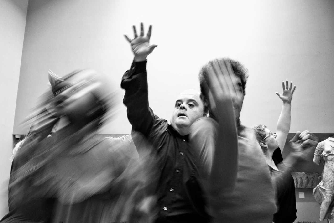 Black and white photo of Graham dancing at Corali professional development class